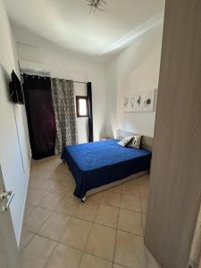 A bed or beds in a room at Sagra Vacanze Cinisi