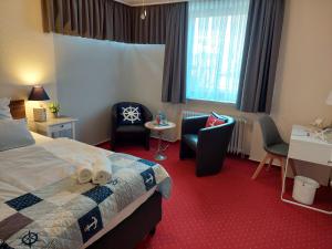 Postel nebo postele na pokoji v ubytování Hotel Rosmarin