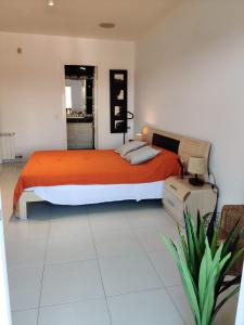 Camí del Mar S´Agaró Apartment tesisinde bir odada yatak veya yataklar