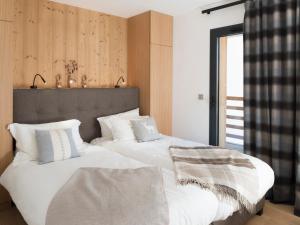 Postel nebo postele na pokoji v ubytování La Cordee 623-Luxury apartment with mountain view and SPA