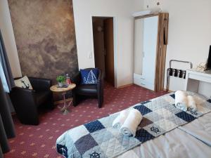 Postel nebo postele na pokoji v ubytování Hotel Rosmarin