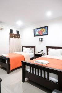 Chambre d'hôtel avec 2 Lits dans l'établissement Pasola Guest House, à Medan