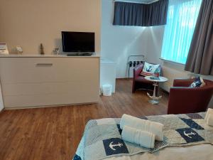 TV a/nebo společenská místnost v ubytování Hotel Rosmarin