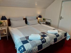Postel nebo postele na pokoji v ubytování Hotel Rosmarin