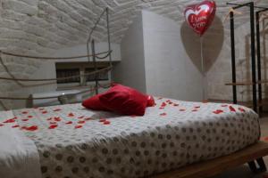Postel nebo postele na pokoji v ubytování Le Vecchie Mura suite & room
