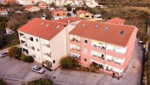 an overhead view of a building with a red roof at Apartment Gloria in Peroj
