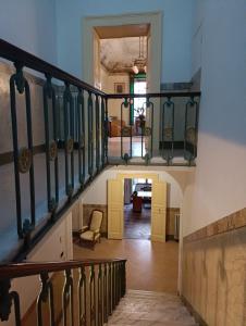 a staircase in a house with a stair case at 44 - Mu Ni in Amelia