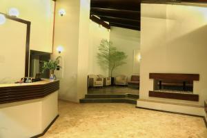 Χώρος καθιστικού στο Essência Hotel Pato Branco