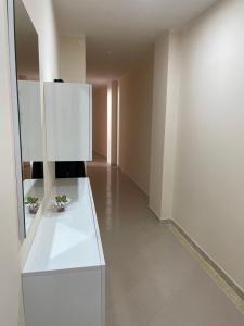 A kitchen or kitchenette at Prima Perla
