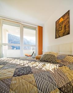 Postel nebo postele na pokoji v ubytování CitySuite Lienz