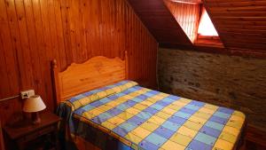 Postel nebo postele na pokoji v ubytování Les Llucanes