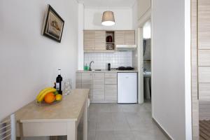 Kuchyňa alebo kuchynka v ubytovaní Yiannis Apartments