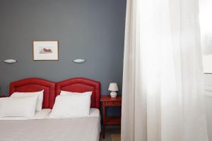 Posteľ alebo postele v izbe v ubytovaní Yiannis Apartments