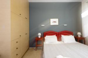 Posteľ alebo postele v izbe v ubytovaní Yiannis Apartments