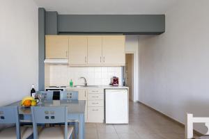 Kuchyňa alebo kuchynka v ubytovaní Yiannis Apartments