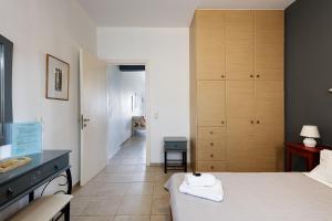 Posteľ alebo postele v izbe v ubytovaní Yiannis Apartments