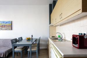 Kuchyňa alebo kuchynka v ubytovaní Yiannis Apartments