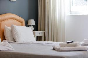 Posteľ alebo postele v izbe v ubytovaní Yiannis Apartments