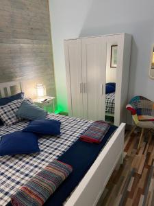 Posteľ alebo postele v izbe v ubytovaní La casa di Gioggiò