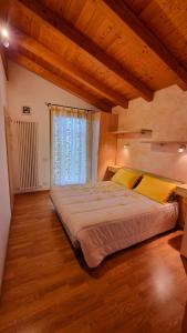 A bed or beds in a room at Villa Venezia