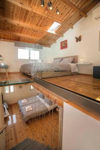 a room with a bed and a glass counter at CHRISAVGI'S LUXURY HOUSE in Mantoúkion