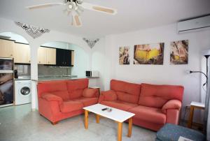 A seating area at Vera Playa Fuentemar
