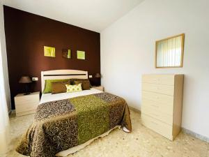 Łóżko lub łóżka w pokoju w obiekcie Casa Aurea