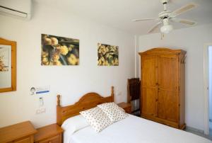A bed or beds in a room at Vera Playa Fuentemar