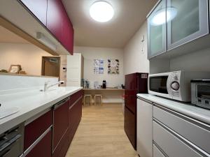 Kuchyň nebo kuchyňský kout v ubytování Guesthouse Kaede Annex + 15 fotografií