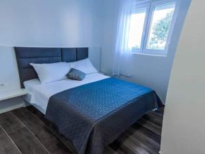 Postel nebo postele na pokoji v ubytování Luxury Villa Jasna 2