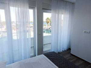Postel nebo postele na pokoji v ubytování Luxury Villa Jasna 2