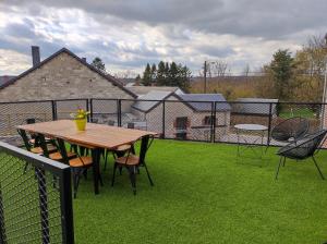 Patio nebo venkovní prostory v ubytování Aux Aguesses buissonnières