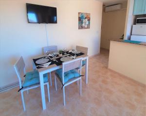 Kuchyňa alebo kuchynka v ubytovaní Precioso apartamento con ascensor a 80 metros del mar