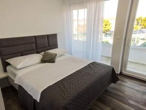 Postel nebo postele na pokoji v ubytování Luxury Villa Jasna 2