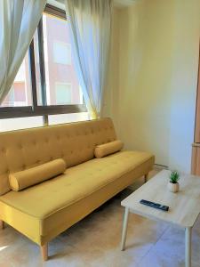 Posedenie v ubytovaní Precioso apartamento con ascensor a 80 metros del mar