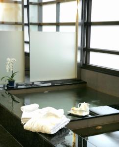 Ett badrum på Fullon Hotel Taipei, Central