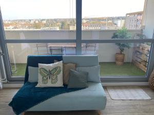 Ruang duduk di Magnifique appartement au coeur de Mulhouse