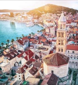 an aerial view of a city with a clock tower at Guest house Lana in Split