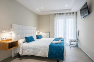 Cama o camas de una habitación en Pension ARCA