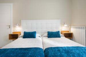 Cama o camas de una habitación en Pension ARCA