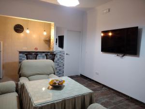 A television and/or entertainment centre at Mi Rinconcito