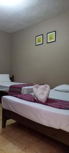 Letto o letti in una camera di Hotel Rosalila