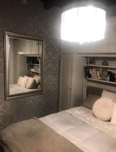 Posteľ alebo postele v izbe v ubytovaní Ancienne Maisonnette