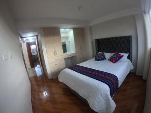 Postel nebo postele na pokoji v ubytování Residencial Chávez Concha / Cusco