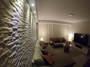 TV a/nebo společenská místnost v ubytování Residencial Chávez Concha / Cusco