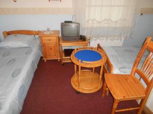 Postel nebo postele na pokoji v ubytování Poska Villa Guesthouse