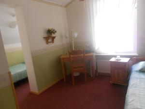 Postel nebo postele na pokoji v ubytování Poska Villa Guesthouse