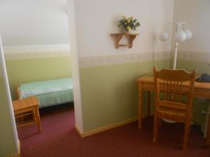 Postel nebo postele na pokoji v ubytování Poska Villa Guesthouse