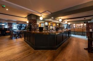 Lounge nebo bar v ubytování Wilmslow Lodge