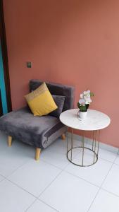 Posezení v ubytování Studio havre aux hibiscus avec piscine proche de la mer